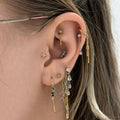 Oor met rook piercing  gezet bij All Perfectly Pierced Rhoon